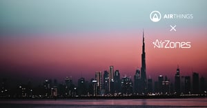 Dubai skyline at dawn with Airthings and AirZones logos