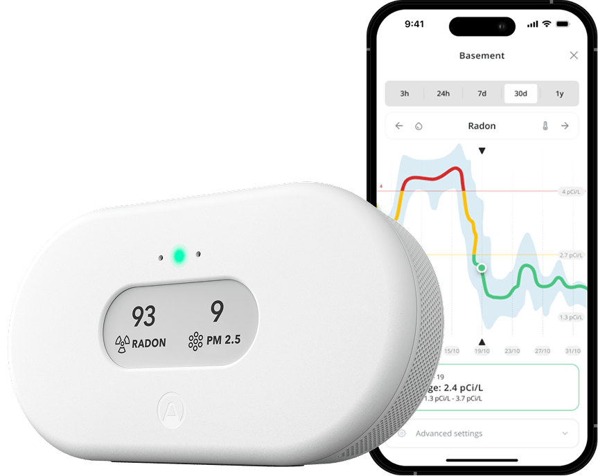 Airthings View Plus device alongside a smartphone showing air quality data