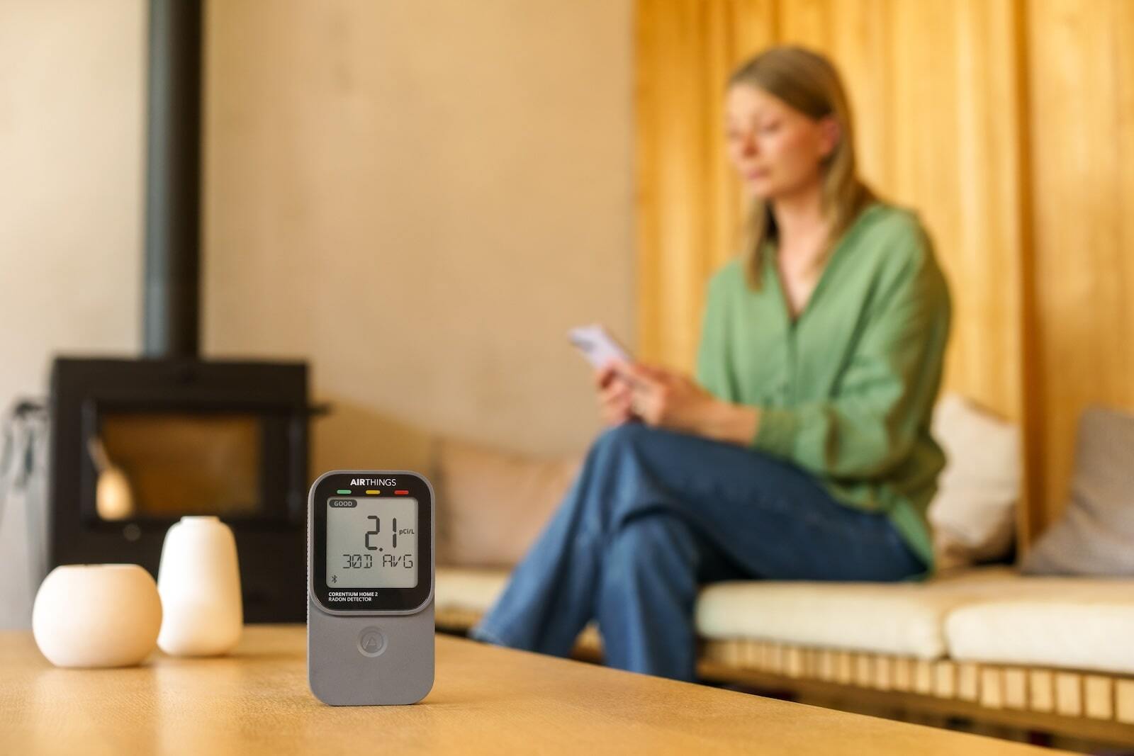 Person checking Airthings Corentium Home 2 radon readings on their phone