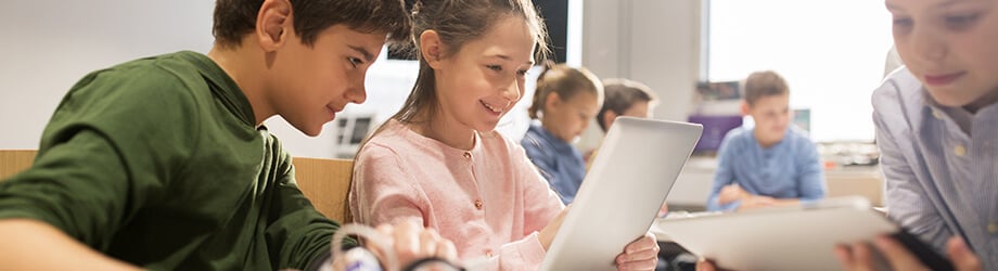 School children using tablets